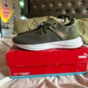 Women’s green Puma tennis shoes